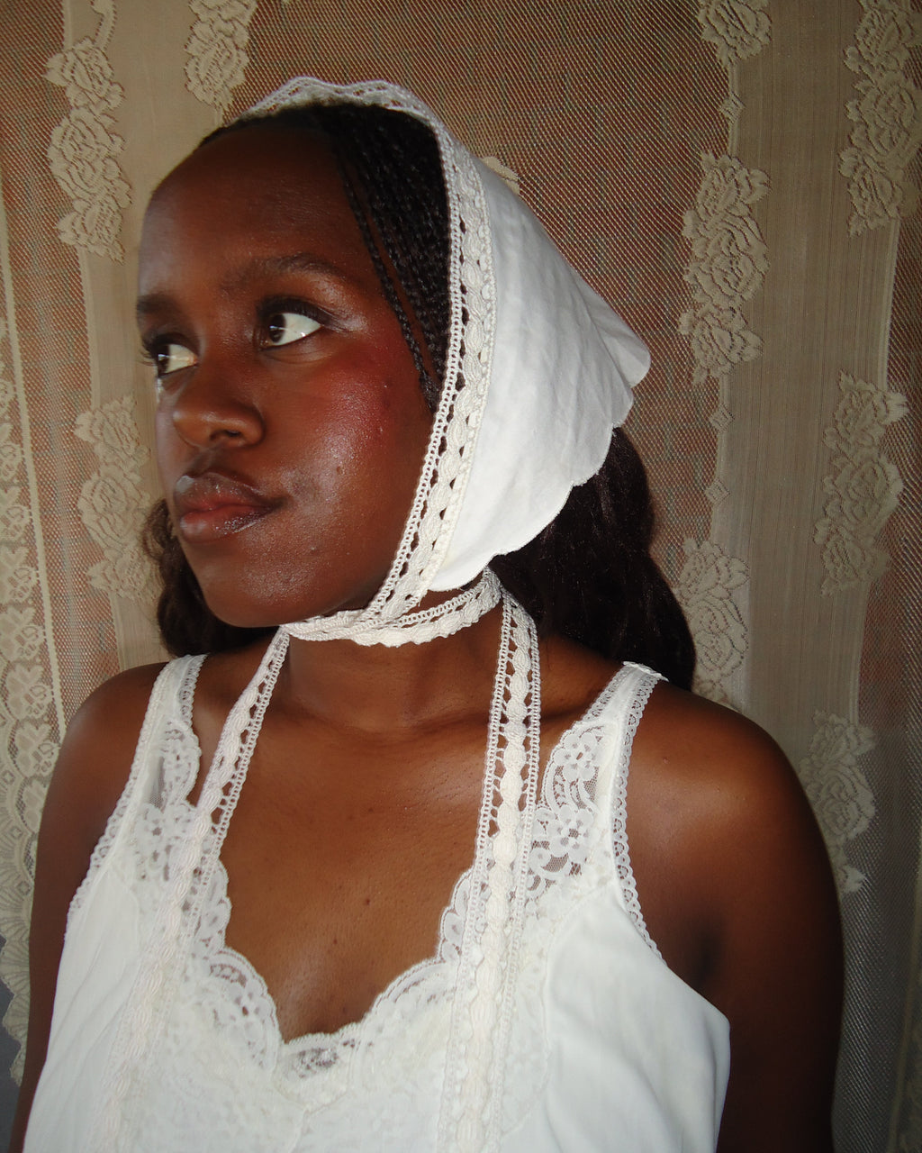 girl wearing white headscarf with lace details